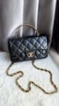 Tui Xach Chanel Flap Handle 24A Black Lambskin